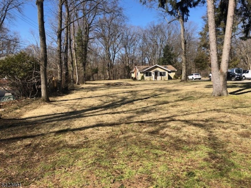 Rare opportunity to own 1.19 park-like acres at the end of a quiet dead-end street. Situated in a non-flood zone, this 3-bedroom, 2 full bath home offers privacy, space, and exceptional potential. This home features a large eat-in kitchen with stainless steel appliances, a spacious dining area, and sliders that open to an expansive yard, creating an easy flow for everyday living and entertaining. The living room is bright and inviting with skylights that bring in natural light. Both full bathrooms offer double sinks, and the primary bedroom includes a private en-suite. A partially finished basement provides additional storage and living space. The level, usable property is the true highlight. Whether you choose to update, expand, or explore potential subdivision opportunities, (buyer to perform due diligence) the possibilities here are significant. AGENTS BRING YOUR BUILDERS!!  Located in a township known for its excellent schools.  Conveniently located and quick access to shopping, dining, major highways, and NJ Transit. Commuters will appreciate the bus stop just two blocks away.