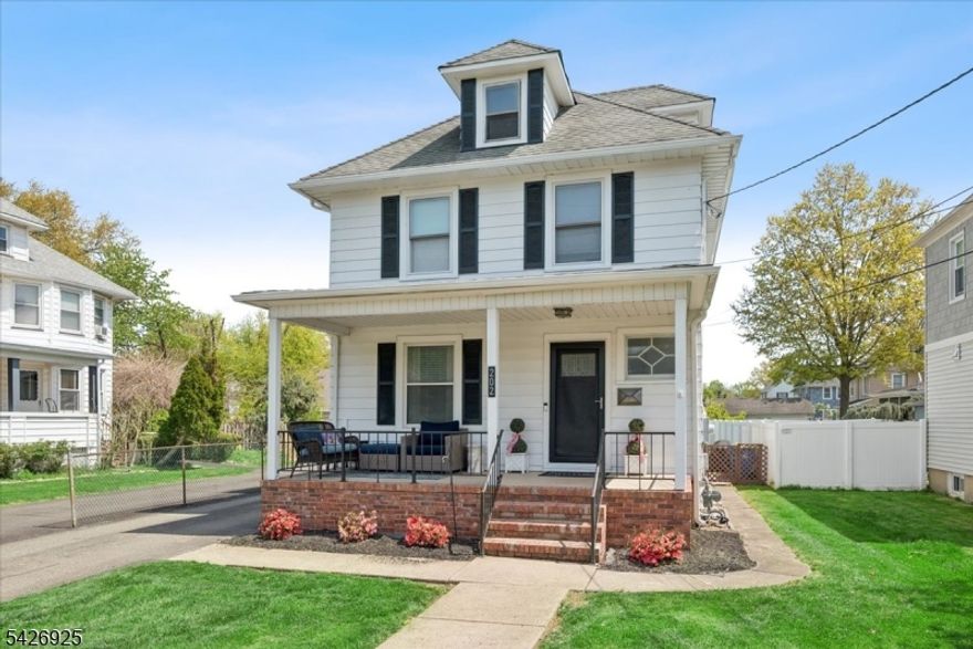 Welcome home to this fully updated 3-bedroom, 2 full bath Colonial ideally located just blocks from downtown Somerville and Main Street. Fresh, modern, and impeccably maintained, this home features a stunning kitchen complete with custom cabinetry, stainless steel appliances, quartz countertops, a breakfast bar, and a stylish tile backsplash. The open-concept layout flows seamlessly into the formal dining room, creating the perfect space for entertaining, and continues into a comfortable living room. Completing the main level is a welcoming foyer that leads to a charming rocking chair front porch, along with a tastefully renovated full bathroom. Upstairs, you'll find three well-appointed bedrooms, highlighted by a primary bedroom with direct access to a full walk-up attic offering endless possibilities ideal for a custom closet, private storage, or future expansion. The second-floor full bathroom has also been beautifully renovated with stylish finishes, adding to the home's move-in-ready appeal. The outdoor space features a large deck overlooking the backyard, perfect for relaxing or entertaining, along with a detached one-car garage with additional attached storage. Enjoy the Somerville lifestyle with this convenient location just walking distance to downtown Main Street, offering great restaurants, shopping, and direct train access to NYC. This is a must-see home!