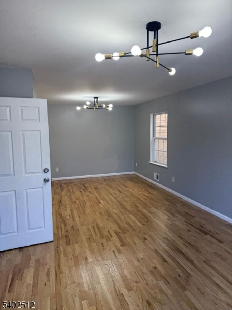 Beautifully newly renovated 3-bedroom, 2-bathroom residence offering modern comfort and convenience in a prime Newark location. This bright and spacious home features updated finishes throughout, a well-appointed kitchen, and tastefully renovated bathrooms designed for everyday living.Enjoy the added benefit of one off-street parking space, a rare and valuable feature in the area. The layout is ideal for comfortable living, with generous bedroom sizes and a functional flow perfect for your needs.Conveniently located just minutes from South Orange Avenue, with easy access to Downtown Newark, the Prudential Center, shopping, dining, and entertainment. Commuters will appreciate being approximately 8 minutes to Newark Penn Station and close to major highways and public transportation, making travel to NYC and surrounding areas seamless.This move-in-ready home combines modern updates, parking, and an unbeatable location an excellent opportunity for homeowners or investors alike.