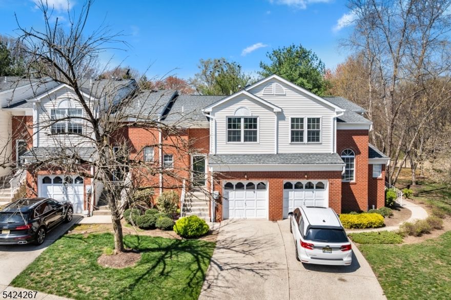 Welcome to Montgomery Hills, a highly sought-after community in Montgomery Township known for its top-rated school system and unbeatable location just minutes from Princeton and the charming town of Rocky Hill. This well-maintained home offers a flexible and spacious layout featuring 2 bedrooms plus a generously sized third room perfect for a home office, den, or guest space. The upper level includes two full bathrooms, including a primary suite with a large walk-in closet and private bath. Plush carpeting runs throughout the second floor, creating a warm and comfortable retreat. The main level features beautiful wood flooring throughout the open-concept living and dining area, highlighted by a cozy gas fireplace. The updated eat-in kitchen is complete with hardwood cabinetry, granite countertops, stainless steel appliances, and a convenient pantry closet. Additional features include a one-car garage and a full unfinished basement with high ceilings, offering excellent potential for future living space. The laundry area is also located in the basement. Enjoy all that Montgomery Hills has to offer, including community amenities and low-maintenance living in a prime location close to shopping, dining, and major routes.