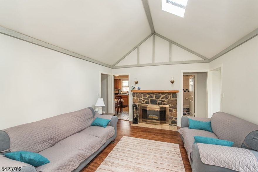 LOCATION! LOCATION! LOCATION! WELCOME TO 22 TIOGA! THIS WELL MAINTAINED RANCH STYLE HOME OFFERS CONVENIENT ONE-LEVEL LIVING WITH 3 BEDROOMS & 2 FULL BATHS. FEATURING GOOD SIZE ROOMS, A FORMAL DINING ROOM, NEW FRONT STEPS, 2 FRESHLY PAINTED ROOMS, EIK WITH OAK CABINETS, 2 SKYLIGHTS THAT FILL THE HOME WITH NATURAL LIGHT, 3 AC WALL UNITS, COZY WOODBURNING FPL THAT ADDS WARMTH AND CHARM. THIS PROPERTY OFFERS BOTH COMFORT AND FUNCTIONALITY.  ENJOY OUTDOOR LIVING ON THE PATIO OVERLOOKING A LEVEL LOT WITH PRIVACY FENCE-PERFECT FOR RELAXING AND ENTERTAINING.  LOCATED IN A DESIREABLE NO FLOOD ZONE AND WITHIN WALKING DISTANCE TO THE TOWN CENTER, THIS HOME COMBINES CONVENIENCE WITH EASY LIVING. A WONDERFUL OPPORTUNITY NOT TO BE MISSED.  ENJOY ALL THAT THE COMMUNITY HAS TO OFFER, INCLUDING TOWN SPORTS, LAKE HIAWATHA POOL, PARKS AND RECREATIONAL ACTIVITIES. THERE ARE GREAT GOLF COURSES WITHIN MINUTES FOR THE AVID GOLFER. THIS PROPERTY WON'T LAST. SELLER LOOKING FOR A 45-60 DAY CLOSE JUNE 1ST POSSIBLY SOONER.