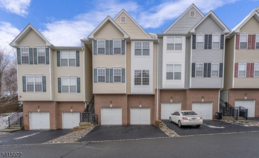 This is the largest second floor unit, Dover 11. A flight of external stair to the front door. Kitchen features stainless steel appliances. Open living and dining room, with hardwood floor. Laundry located in the hallway. Two large bedrooms. The primary has an en suite and walk in closet. The second bedroom is also large and is served by a hall bathroom.This unit has internal stairs to the private garage. There is also a very large storage area in this unit. First $100 in repairs paid by tenant. tenant insurance required