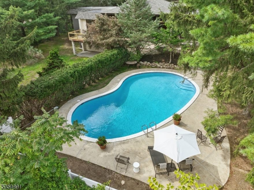 Luxury living at its finest with your own in-house spa! So many amenities: heated Gunite outdoor pool, inside sauna for two, media room and a huge entertainment area complete with built in full size wet bar and fridge, fireplace, with walk out to the backyard. This property is at the end of a quiet dead-end road offering privacy and quiet. Enjoy multiple outdoor patios and large outdoor deck surrounded in your private backyard. This modern 5 bed/4 bath custom home has been completely renovated with all new 2 zone HVAC, plumbing, water heater and new roof. The stunning gourmet kitchen features new cabinetry, center island, new SS monogram appliances, wine fridge, built in micro and quartz counters that opens up to the large family room. All four bathrooms feature new tile, designer vanities and fixtures. The primary suite opens to its own stone patio.with pool views. Gorgeous stone walls, fireplace, floor to ceiling windows are some of the features that make this home truly special. This is a one-of-a-kind home!