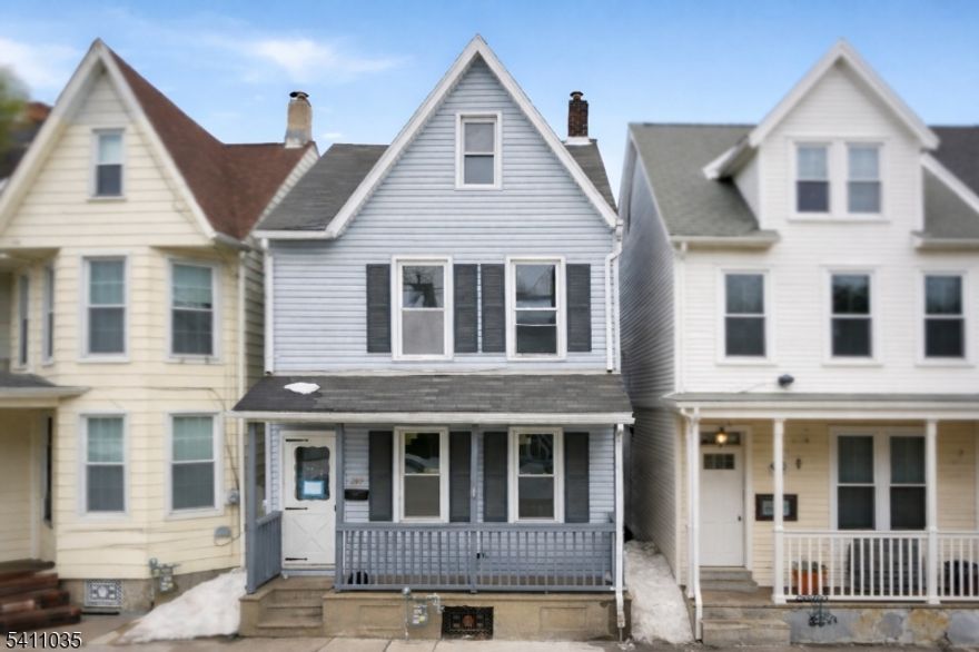 Completely rebuilt from top to bottom, this fully renovated 3-bedroom, 1-bath Colonial offers peace of mind with all major systems and finishes brand new, not refinished. The home features all-new plumbing throughout, including a brand-new city sewer line, and entirely new electrical systems, from the interior wiring all the way to the service line to the street. Additional major upgrades include a new roof, siding, chimney, flooring, and high-efficiency windows, as well as a new natural gas hot water heater. The entire kitchen has been fully redesigned, featuring new cabinetry, appliances, and finishes. The interior showcases new flooring throughout and a freshly completed layout designed for everyday living. A finished attic with heat vents provides additional usable space. Enjoy outdoor living on the newly redone side porch, and take advantage of the new Bilco door offering convenient basement access. The basement is clean and accessible, ideal for storage or future use. Off-street parking includes a two-car parking pad in the rear, accessible via the alley. The home has a clear Certificate of Habitability, making it truly move-in ready. Conveniently located near local shops, dining, and everyday amenities, this home offers the rare combination of classic Colonial charm with the confidence of updated systems throughout. Browse our virtually staged photos to envision the space beautifully furnished and ready to call home!