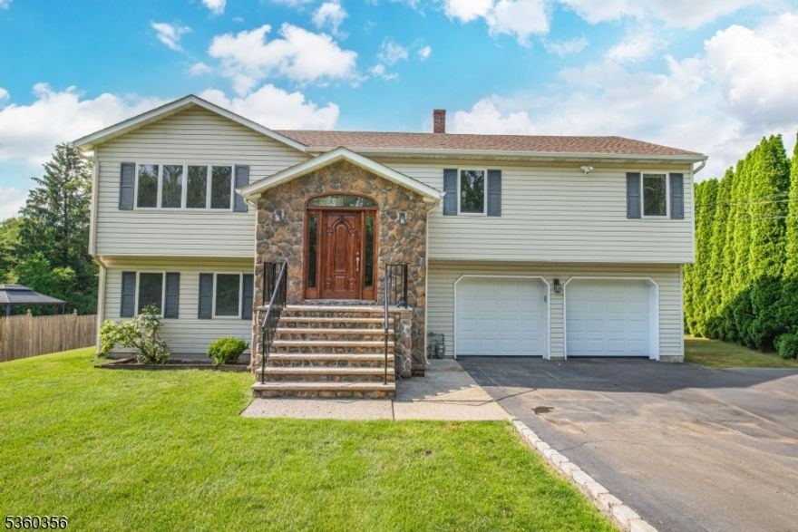 COUNTRY LIVING AT IT'S BEST JUST MINUTES FROM WHERE YOU NEED TO BE! IF IT'S PEACE AND QUIET YOU DESIRE, LOOK NO FURTHER THAN THIS HORSE FRIENDLY CUSTOM BI LEVEL WITH HOLDING BARN WITH 2 STALLS BUILT AND OCCUPIED THE BY ORIGINAL OWNER.  2025 RENOVATION INCLUDES NEW EAT IN KITCHEN, 3 NEW BATHS, REFINISHED HARDWOOD FLOORS AND 2 TIER NEWLY REFINISHED DECK. THE OVERSIZED 2 CAR GARAGE HAS NEW DOORS/AUTO OPENERS. BEAUTIFUL TALL ARBORVIATES SURROUND THE 1.6 ACRE LOT PROVIDING INCREDIBLE PRIVACY. PRESTIGIOUS TOWACO/MONTVILLE TWP OFFERING LOW TAXES/TOP RATED SCHOOLS/MINUTES FROM RTS.202/287/23. Perfect for commuters! 25 miles to NYC/ NJ Transit Bus and Train minutes away! NOTE:  Pool table in family room remains with home.