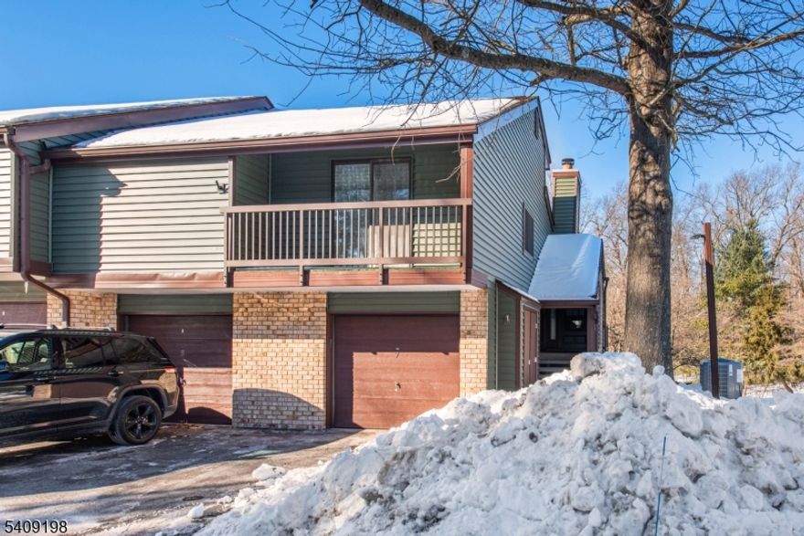 Thoughtfully designed two-level condo featuring a bright living room with wood burning fireplace, along with the kitchen and dining areas on the ground floor with direct access to a private patio backing to a wooded area for added privacy. The upper level offers two well-appointed bedrooms, and two full baths, plenty of closet space. Includes attached garage, community pool and so much more!