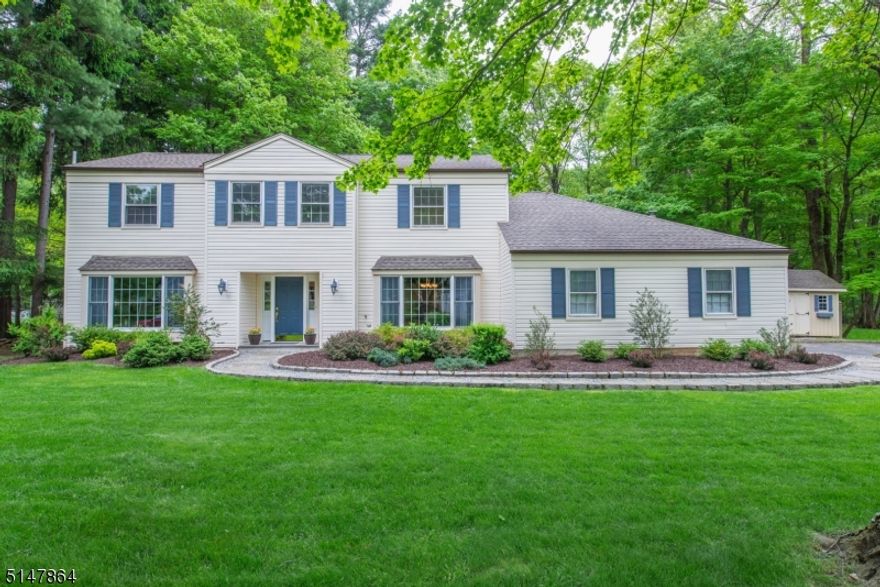 Wow, tremendous curb appeal!  Impeccably maintained with one of the nicest backyards in the neighborhood!  Family room with Franklin stove and French doors to patio, kitchen with stylish tin ceiling, white cabinets, granite counters, and stainless steel appliances, huge living room and formal dining room, updated Powder Room.  Primary bedroom suite with huge walk-in closet and updated full bath plus three generous sized additional bedrooms and updated marble main bath.  HW Floors under carpet in BR's.  Paver patio overlooks fully fenced rear yard, backing up to green acres.  Miles of sidewalks in this established, mature development.  Newer roof, baseboard hot water has fired heat, central air.  Long Valley schools and West Morris Central High School.