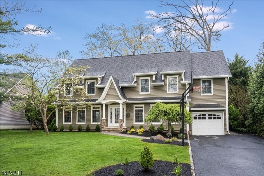 Exceptional curb appeal sets the stage for this picturesque residence,ideally situated on a tree-lined street in one of Glen Rock's most sought-after neighborhoods.built in 2003,this pristine 4 BR, 2.5-bath center hall Colonial offers timeless design & modern comfort throughout.A gracious EF welcomes you,flanked by a FLR & elegant DR perfect for both everyday living & entertaining.The sun-filled EIK features stainless appliances,granite countertops,& heated floors,with an open flow into the inviting FR highlighted by a gas fireplace with a marble surround.SGDs lead to a spacious stone patio overlooking a private backyard with an ideal setting for outdoor dining,gatherings,& play.The 1st level is completed by a conveniently located PR & direct access to the attached garage.Upstairs,the luxurious primary suite serves as a true retreat,boasting vaulted ceilings,a walk-in closet,& spa-like ensuite bath featuring a skylight,double vanity,jetted tub,separate shower,& heated floors.Three additional generously sized BRs offer ample closet space (including an additional walk-in),while the airy hall bth features a vaulted ceiling & skylight.A convenient 2nd floor laundry adds to the home's thoughtful design.The expansive lower level offers exceptional versatility ideal for recreation,relaxation,or guest accommodations.Enjoy all that Glen Rock has to offer,with top-rated schools,shopping,dining,& convenient NYC transportation just moments away.More than a home,this is a lifestyle.