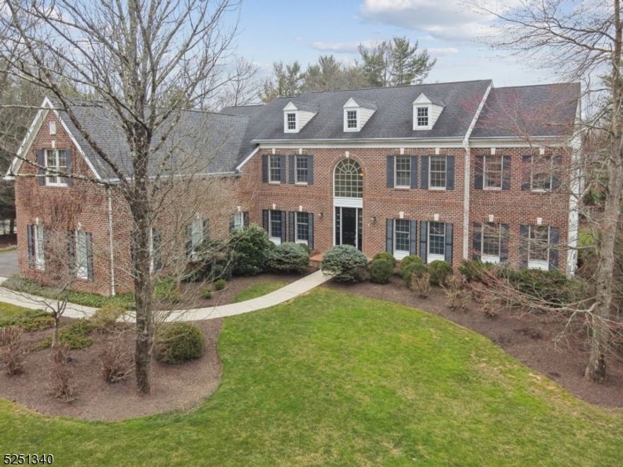 Gorgeous 5300 sqft Toll Bros home in Canterbury Estates!  Freshly painted in neutral tones with hardwood floors throughout most of the main level, the home features an extended kitchen with a sunroom off the breakfast area. Bright kitchen with white cabinetry, elegant black granite countertops, and SS appliances - including two new dishwashers & a new refrigerator. Large pantry and laundry room are conveniently located in the back hall near the garage entrance. Beautiful two-story family troom w/stone fireplace is flooded with natural light from the floor to ceiling windows. The conservatory/game room, located off the formal living room, offers another versatile space for relaxation and recreation. The primary suite is a sanctuary unto itself, boasting four walk-in closets, a spacious dressing area, a sitting room and a three-sided gas fireplace. The primary bath has a large soaking tub, stall shower, and a private water closet. Four additional bedrooms round out the second level: two en-suite and two connected by a Jack and Jill bathroom. 1700 sqft finished basement - features a gym and home theater equipment and an office. Additional features include three HVAC units (one newly replaced), a three-car garage, gutter guards for minimal maintenance, and a charming paver patio with a half-wall. Another week or two and the trees will be blooming!  The house has been power washed, the windows were just cleaned, the yard's been mulched - you could be in by summer!