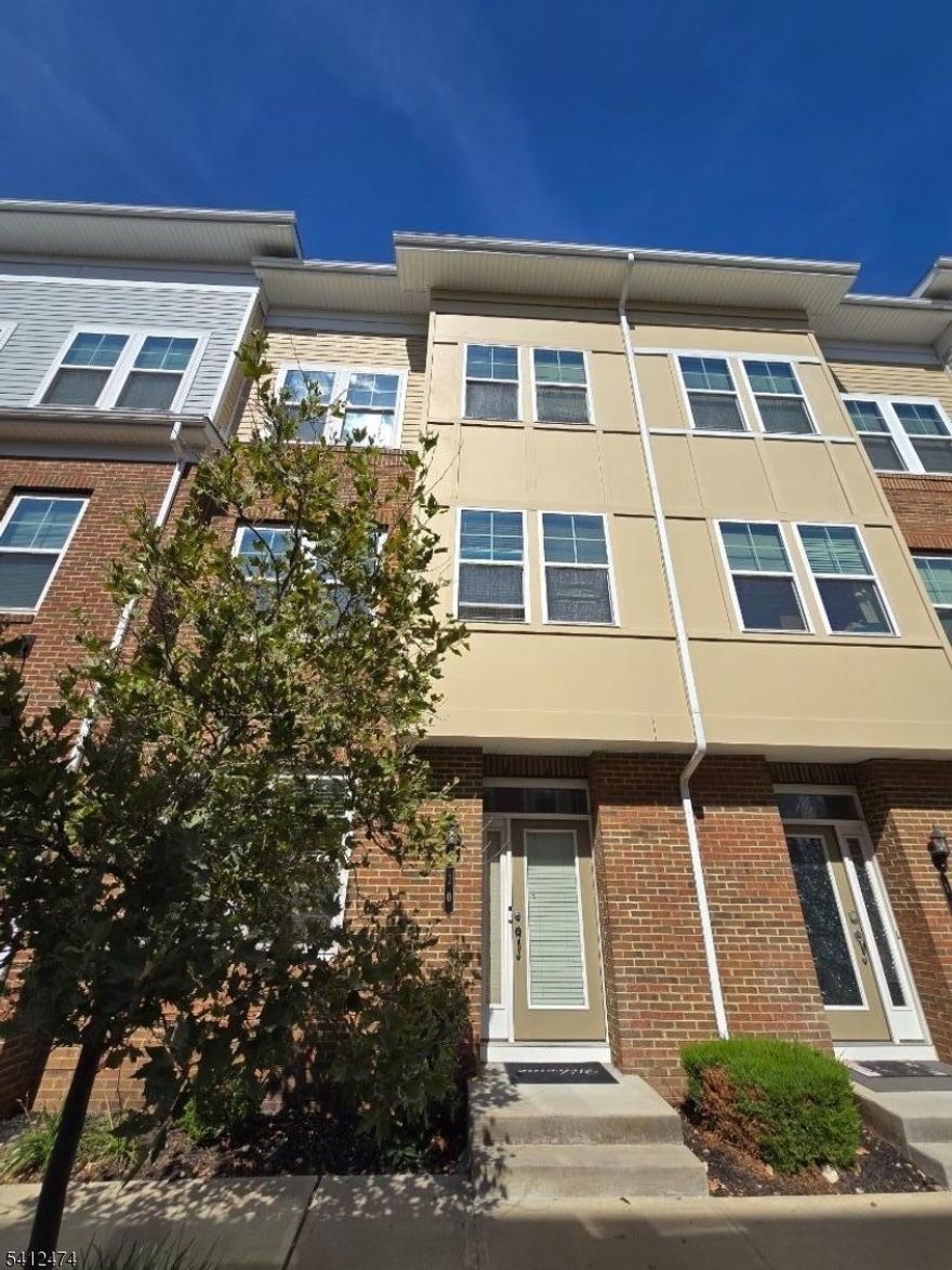 Feel the comfort & convenience of 10 Bond st! This beautiful, well-maintained 3 bedroom 3 bath townhouse boasts 4 floors of immaculate space. Enjoy the convenience as this home is ideally situated close to highways, public transportation, restaurants and shopping! The 1st floor showcases a beautiful den area, with a full bath & garage access. 2nd floor is an open layout living/dining room & kitchen with access to an outdoor balcony. 3rd floor holds the master bedroom with a master bath, as well as two other bedrooms & washer & dryer closet. 4th floor has a den & a beautiful second outdoor balcony space. Welcome to your future home!