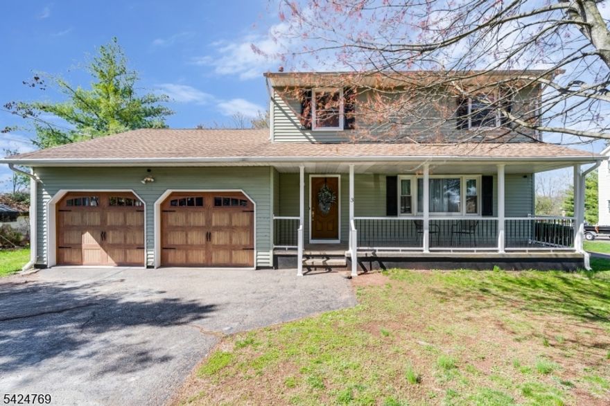 Welcome home to a property that truly delivers space, versatility and endless potential. Invest some time and imagination to make this your own. This home is a unique opportunity in an excellent location. Boasting an incredible amount of garage and workshop space, including a 2 car attached garage AND an oversized 2 car detached garage with its own dedicated driveway and workshop area, perfect for the hobbyists, business owners, or anyone needing serious storage. Set on over a half an acre, the property features dual driveways and a yard that feels like it stretches for miles, offering both privacy and room to expand or entertain. Inside, you'll find spacious bedrooms, updated baths, beautiful hardwood floors and a flexible layout designed to adapt to your lifestyle. First floor bedroom could be used as dining area, giving you options to suit your needs. The sunken family room is a standout space complete with sliders that open to an enormous deck area. The finished basement offers a blank canvas ready for your personal touch, whether it's a home gym, office, media room or more. Additional features include, Lenox furnace 2014, Hotwater heater 2023, water softener, owned, outdoor shed, a layout that blends comfort with functionality, a long with the perfect location for commuting. Close to shopping, major highways, restaurants, schools and the local hospital. IF you have been looking for a home with space to live, work and grow.  This is it, so come and get it!