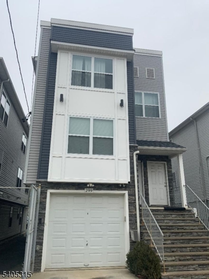 Home build 2022 , 2 apartments with recreation room each apartment with 3 bedrooms, living room, dining room, kitchen and 2 baths, rec room with full bath 2 rooms. Wood ceramic floors, c ac -heat. 1 car garage, common driveway to rear. All tenants are month to month