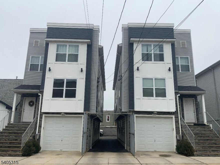Home build 2022 , 2 apartments with recreation room each apartment with 3 bedrooms, living room, dining room, kitchen and 2 baths, rec room with full bath 2 rooms. Wood ceramic floors, c ac -heat. 1 car garage, common driveway to rear. All tenants are month to month