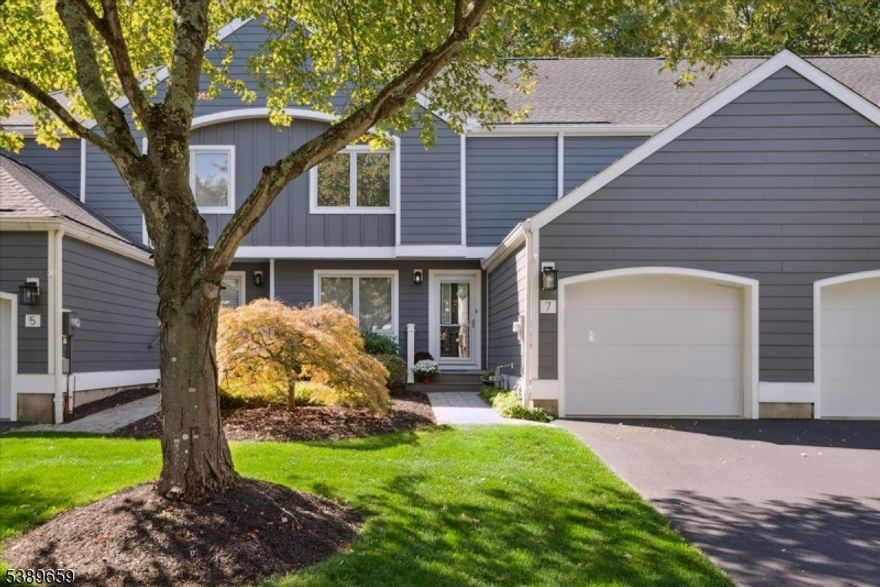 Experience refined townhome living in the prestigious Woodside community, where thoughtful design meets everyday comfort. This beautifully maintained 2-bedroom, 2.5-bath unit offers the perfect balance of comfort, space, and convenience. The main level features a bright living room with soaring cathedral ceilings, a formal dining area, and an eat-in kitchen that flows into a cozy family room with a gas fireplace. From here, step out to a private patio surrounded by mature trees and a tranquil wooded backdrop. Upstairs, a spacious loft area, along with the primary suite with a large WIC featuring two separate sections, primary bath complete with a jetted tub and separate stall shower. The 2nd bed enjoys easy access to a full hall bath, providing comfort. The partially finished basement offers a spacious recreation room, storage areas, laundry + workshop space, and utilities, offering excellent great. Residents enjoy tennis courts lined for pickleball and beautifully landscaped grounds. Perfectly situated just minutes from the vibrant downtown, where you'll enjoy an exceptional mix of fine dining, boutique shopping, cultural attractions, NJ Transit direct train to NYC, major highways ensuring effortless commuting and travel. Nearby you'll also find the Morristown Field Club, Footes Pond Nature Preserve, and top-rated Morristown Medical Center. Experience the best of low-maintenance living and vibrant suburban lifestyle in one of Morristown's most desirable communities.