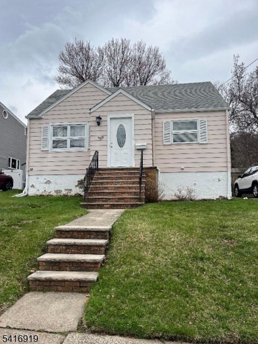 LOVELY EXPANDED CAPE, GREAT LOCATION,ENTRANCE FOYER , 3 BEDROOMS,LIVING RM, DEN OR OFFICE,  EIK KITCHEN, NICE SIZE YARD, HARDWOOD FLOORS,PART. FIN.  BASEMENT
