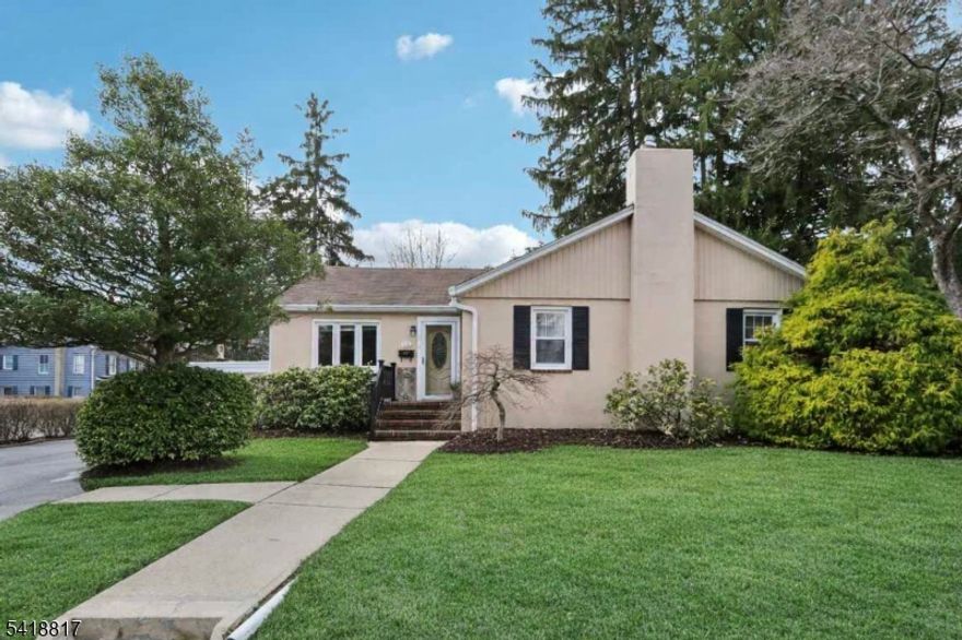 Charming and full of warmth, this 3-bedroom, 1-1/2 bath ranch offers one-floor living on a premium corner lot. Timeless hardwood floors & sun-drenched living spaces create a cozy, inviting atmosphere, while the stair-free layout ensures comfort and convenience. Perfectly located for commuters, this home offers easy access to NJ Transit, downtown shopping, award-winning dining, Centenary University, local schools and playing fields. The surrounding community is also ideally situated near several state parks, making it a great choice for outdoor enthusiasts. Inside, three bright bedrooms await with ample closet space, complemented by a large basement and a dedicated workshop with two workbenches ideal for hobbyists plus extra storage area.  The unique dual-entry driveway fits six cars and a detached one-car garage with additional storage room. Outside enjoy a park-like backyard and private deck, perfect for entertaining and relaxing. Whether you're a first-time buyer, downsizing, or seeking a high-value investment, this home combines charm, practicality, and an unbeatable location in one appealing package.