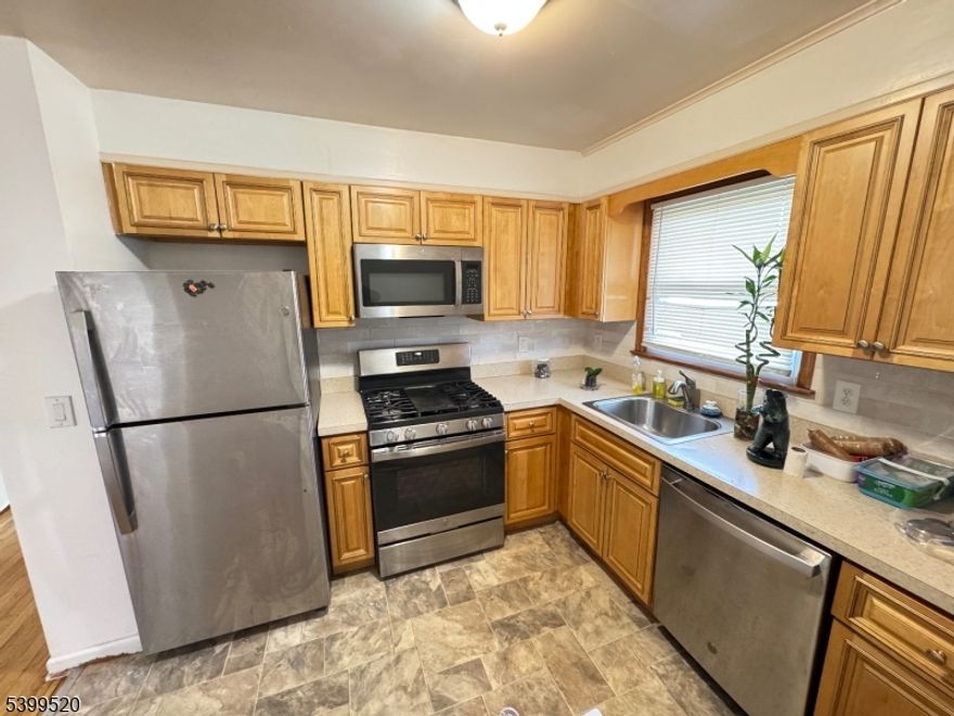 Welcome to your new home! This well-maintained freshly painted 3-bedroom, 1-bath property in Rahway, NJ offers a comfortable and inviting living space perfect for anyone seeking a cozy and convenient place to live.The kitchen comes fully equipped with a refrigerator, stove, dishwasher, and microwave, making move-in easy and stress-free. Each bedroom provides ample space, and the home features bright natural light throughout. Enjoy a layout that's both functional and welcoming.