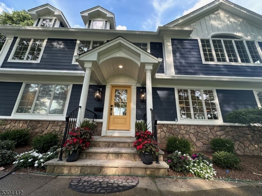FULL GUT RENOVATION in 2024! Modern colonial on one of the most desirable locations in Glen Rock, only a block away from top ranked Schools. Approx 3,600 SQFT of living space (incl/basement) w/ Open and functional floor plan. EF welcomes you to a formal LR/FPL, DR w/bar, Gorgeous Kitchen w/beautiful quartz countertops, large island and large Pantry room that Opens to a Bright Family Room w/FPL, skylights and sliding doors w/access to a nice deck and fully fenced Backyard. A convenient 1st floor BR and a beautiful Bath complete this floor. 2nd level offers 2 spacious BR w/walk in closets, elegant main Bath, private Den/office w/French doors and a large Primary Suite w/ luxurious spa like Bath and plenty of closets. THE FOLLOWING ARE NEW- electrical, plumbing, HWH, white oak wood floors, Anderson windows, Hardie Siding, All Bath w/designer tile, Lux Kitchen walnut cabinets, contemporary FPLs. Beautiful Lighting, Foam and Sound insulation...Oversized 2 car garage w/EV, House generator...