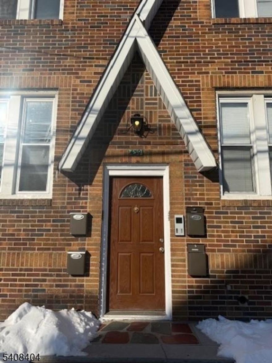 RENTAL AVAILABLE FOR SECTION 8 APPLICANTS. Unit #4 upstairs to the left from front door. Freshly painted with new kitchen appliances and new cabinets. Newly renovated bathroom. Move in ready. Large spacious rooms. Includes covered carport parking for one car. Has intercom system. Street parking also available, Quiet neighborhood. Schools close by and very close to South Orange and Seton Hall University.