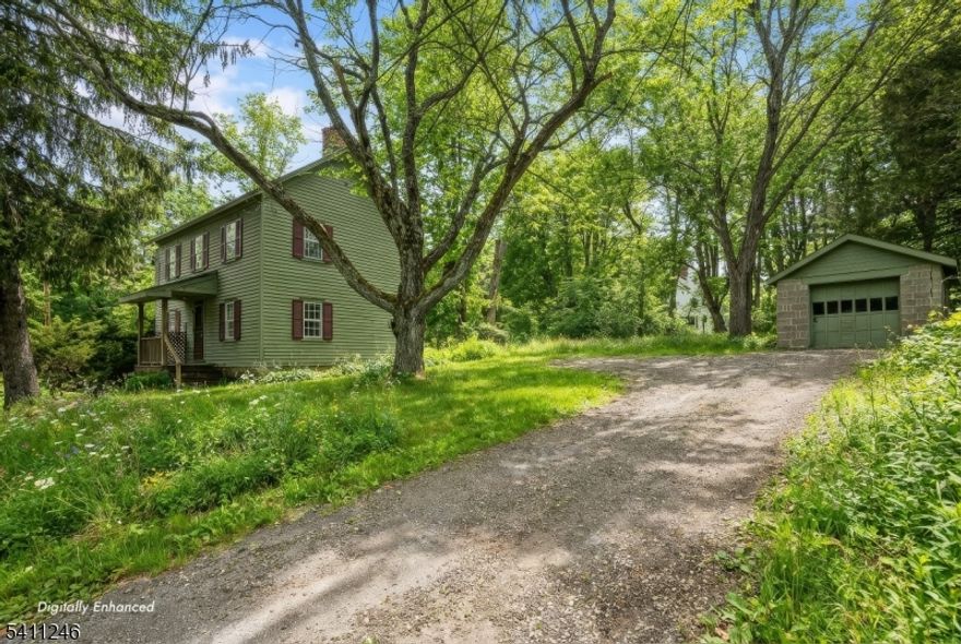 Charming 1908 Colonial set on .42 acres directly across from The Cooper Gristmill and adjacent to over 1,000 acres of preserved Morris County parkland. Enjoy waterfall views from the home and an elevated setting overlooking the surrounding natural landscape.This classic residence offers timeless character, a one-car detached garage, and a fenced yard. The property benefits from strong rental history, offering flexibility for investors or buyers seeking a distinctive home in a scenic and historic setting.The area offers access to hiking trails, equestrian facilities, and sports clubs, along with nearby farm stands, shopping, and dining. Convenient to major roadways and nearby NJ Transit rail service, the location blends rural character with commuter accessibility.