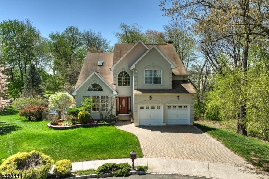 Stately & immaculate Colonial nestled in the perfect cul-de-sac location, features new 2-zone Furnace & A/C (2022), Tankless/On-Demand hot water system (2022), underground sprinklers, paver driveway, manicured lawn& flowerbeds, gutter guards & an abundance of natural light which is sure to impress. A true outdoor retreat for nature lovers, this nearly 1-acre property offers a park-like setting, surrounded by woods offers exceptional privacy. Vacation in your backyard enjoying the outdoors from the spacious maintenance-free Trex-style deck, a dip in the above-ground pool w/ new liner,or unwind in the hot tub ideal for relaxing or entertaining. Upon entry, an inviting 2-story Foyer greets you & seamlessly flows to spacious& sunny Living Rm & Dining Rm,both w/ crown molding& wood floors. Stylish Kitchen boasts new quartz countertops, white cabinets,island w/storage & sliders to picturesque yard. Adjoining Family Rm features fireplace & wall of windows-a truly serene ambiance. Expansive Primary Suite boasts vaulted ceiling, skylights,2 W/I cedar-floor closets, Bathrm w/jetted tub & double vanity-a peaceful refuge. 2nd floor w/3 more ample size Bedrooms & hallway overlooking stunning Foyer below. Basement features extra tall 10 ft ceilings, an abundance storage, home-gym area & opportunity for recreation or office space- the possibilities are endless! Highly rated BRRSD (Milltown)& close proximity to highways, shopping, dining, entertainment, fitness& trains complete this offering