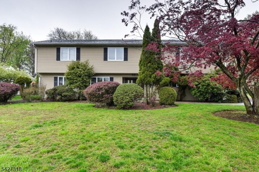Welcome home to your over 4000 square foot house, where you will have all comforts and luxury you desire in this well established neighborhood. This large beauty sits perfectly on over a third of an acre lot which features manicured grounds and a fenced in private yard to create your own oasis. There are many access features into the home where you will find a great layout with a flexible floor plan that is sure to impress and accommodate everyone's needs.. The main house has 4 bedrooms, 2.5 baths living room, family room, eat-in-kitchen, dinning room, and a large semi finished basement. There is a 2 floor large in-law suite which has 2 bedrooms, 1.5 baths, living room, dinning room, and kitchen. There is plenty of parking with a long two car wide driveway and two car built in garage. Walking distance to schools and nearby house of worships, parks, shops, and stops. Make this a must see and it won't disappoint.