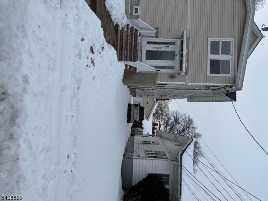 Desirable nelgborhood. Each unit features two bedrooms along with a fully finished attic and finished basement. .