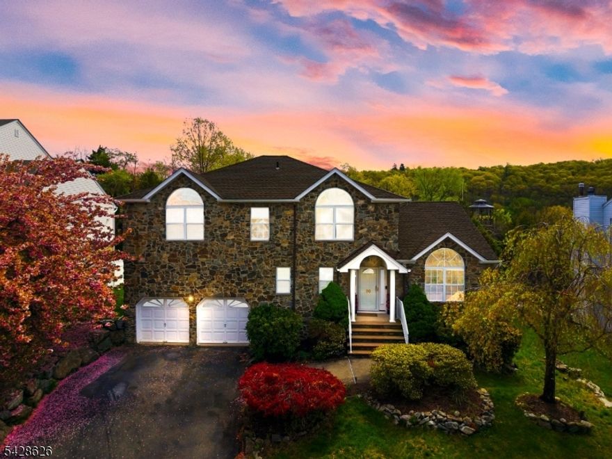 This commanding Colonial stands as a testament to meticulous maintenance and timeless design, offering massive value for the expansive living space provided. Situated in a well-established and highly sought-after neighborhood, the home?s striking architecture and two-car garage immediately capture your attention. Upon entering, you are greeted by sun-soaked living spaces defined by soaring vaulted ceilings and an abundance of natural light that flows seamlessly throughout the open and airy layout. The floor plan is designed for both grand entertaining and comfortable daily living, ensuring every square foot is utilized to its full potential. The second level is highlighted by a true primary suite, a bright and serene retreat featuring huge windows, a generous walk-in closet, and a private ensuite full bath. In addition to the primary, the home offers three more spacious bedrooms and a total of three full and one-half baths to accommodate a variety of lifestyle needs. For even more versatility, the finished walk-out basement features a dedicated den, providing the perfect footprint for a home office, media room, or guest quarters with easy access to the outdoors. Combining a pristine interior with the charm of a classic neighborhood, this residence represents a rare opportunity for those seeking quality, space, and a home that truly commands presence.