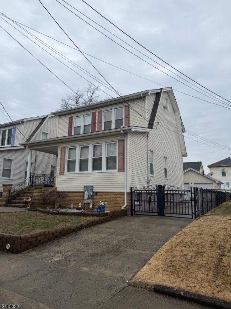 IMACULATE ONE FAMILY HOUSE WITH LARGE ROOMS, FOUR BEDROOMS WITH TWO FULL BATHS, BIG KITCHEN AND DINNING ROOM COMBINED WITH LIVING ROOM, HARDWOOD FLOORS THROUGHOUT, FINISH BASEMEMT WITH A WALKOUT DOOR TO THE YARD, A MUST SEE!!!!!!!!!!!!!!!!!!!