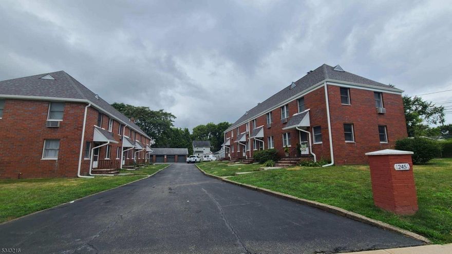 Location Location Location!  First time on the market in over 70 years. Two well-maintained brick buildings with a total of eight townhome style - two floor apartments, 5 car garage, on over half an acre. Seven of the units are approximately 1088sq.ft with 2bd/1bath. There is one 3bd/1.5bath approximately 1245 sq.ft. Location and layout makes the property ideal for a conversion to townhomes. Ez-Commute to NYC