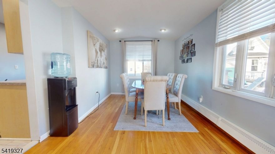 Welcome to this beautifully maintained 3BR/2BA Colonial on a quiet dead-end street at 29 Long Ave in Hillside, NJ. Hardwood floors and recessed lighting are throughout. The lower level includes a finished basement with a private entrance and a second kitchen offering great potential.. Enjoy a private fenced backyard with a large storage shed. Updates include a new roof and front siding (2024). This spectacular home is conveniently located just 8 minutes from Newark Liberty International Airport.