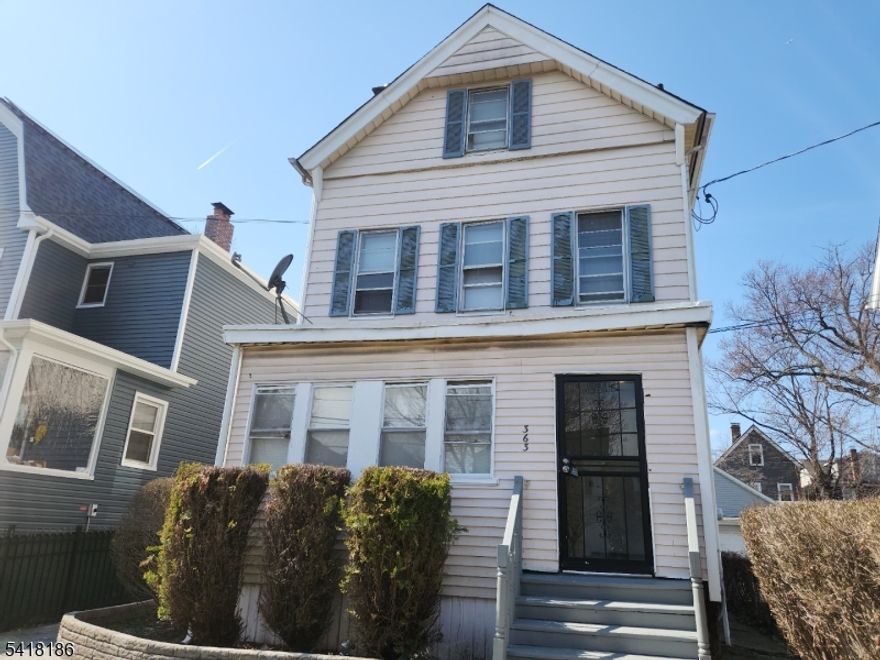 Great opportunity to own this 2-family home for sale in Orange, NJ. 363 High Street features a first-floor unit with 1 bedroom, 1 bath, kitchen, and living room, and a second-floor unit with 3 bedrooms, 1 bath, kitchen, and living room.an enclosed porch and a deck for your entertainment. Ideal for owner-occupants or investors, this property offers excellent rental income potential and flexible living options. Conveniently located near shopping, schools, public transportation, and major highways. A smart choice for anyone seeking a multi-family property in Orange, New Jersey.