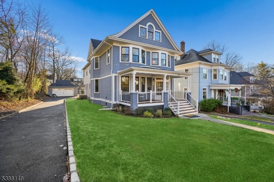 Set on nearly 1/3 of an acre in the coveted 'Park View' neighborhood, this gracious period home has been thoughtfully expanded and renovated by upscale builders Lefko Borthers to offer exceptional living space across 4 levels. A covered front porch opens into a large formal foyer with custom millwork and polished hardwood floors. The formal living room and dining room pay homage to the original home with tall French doors and built-in display shelving and boast modern ceiling light fixtures. An oversized and versatile breakfast room offers a cozy built-in dining nook, wet bar with cabinetry and powder room. Towards the rear of the house, find the incredible chef's kitchen with center island with prep sink and seating, quartz counters, marble subway tile backsplash, and butler's pantry and the family room with gas fireplace and sliders to the patio and yard. A convenient mudroom offers coat closet and built-in storage, as well as access to the driveway. Upstairs, find 6 bedrooms and 4 full baths arranged across the upper levels, plus 2nd floor laundry room with full-sized appliances. The dreamy primary bedroom offers a private retreat overlooking the backyard with tray ceiling, 2 walk-in closets and full bath with double vanity, WC, soaking tub and heated floors. The lower level offers a 2nd powder room, rec space and storage. Outside, find sprawling lawns, patio and 2 car garage. Enjoy a vibrant and active neighborhood with just steps to NYC train, park and Maplewood Village.