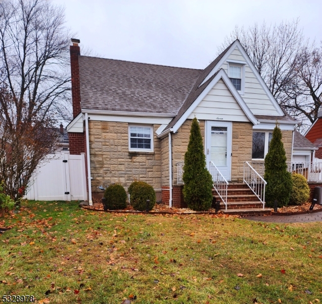 Well maintained Renovated expanded C/C on tree lined st in Lodi.Home has 4 Bed,2 updated full Bath.Hardwood floors Large beautiful renovated kitchen S.S appliances Quartz Countertop,Large finished full basement, Plenty of parking, Large fenced in backyard Close to shopping,parks,schools, transportation, major highways,short drive to GWBridge NYC.