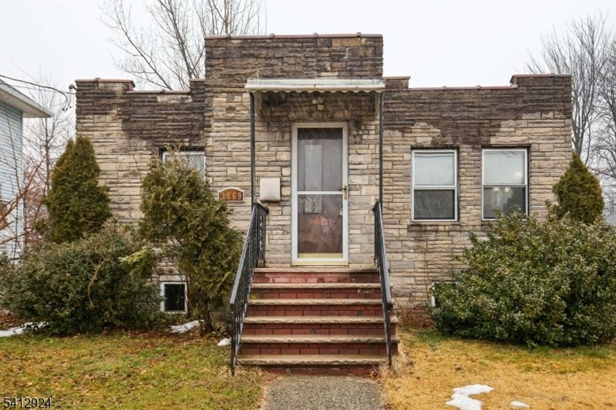 ATTENTION, BUILDERS AND INVESTERS! You can't miss this oppertunity! Ranch style with flat roof, Long driveway wto a detached garage.  You can either renovate to add the 2nd floor or know down to put up a new construction.  It is a MUST see .....House strictly sell as is condition, priced to sell quick.