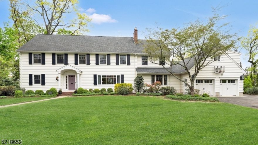 Unparalleled style and ease of living combine to give you the best Ridgewood has to offer. Nestled in the coveted Willard neighborhood, just steps from school and NYC train, this exceptional 5-bedroom colonial has been meticulously renovated to offer something for everyone! It's a fantastic entertaining home with seamless flow from room to room. The spectacular custom kitchen boasts two Quartz islands outfitted with high-end appliances and the most stunning blue cabinetry. A first floor suite welcomes guests with a relaxing sitting room and private deck, or make this your primary retreat. The magnificent primary bedroom is the pinnacle of luxury with custom walk-in closet and marble bath. A spacious finished basement includes a game room, media room, gym and full bath. Outdoor living at it's finest with a pergola-covered bluestone terrace, built-in grill and fire pit that overlook the spacious yard and garden. The updates are endless. This home will capture your heart!