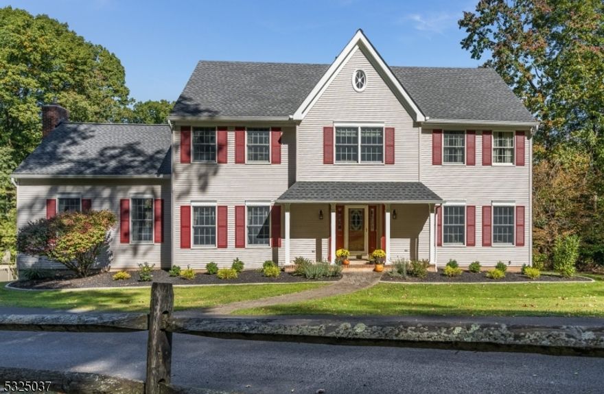 A RECENTLY RENOVATED, SUPERBLY  MAINTAINED & SPARKLING CLEAN 4BDRM & 2-1/2 BATH BRINKERHOFF-BUILT COLONIAL ON A GORGEOUSLY LANDSCAPED 2.52AC LOT WITH LOVELY PERENNIAL GARDENS, AN ENORMOUS 950 SQ FT DECK WITH A SHADE-PROVIDING ARBOR, AND A GREAT LOCATION JUST MINUTES FROM RT 78 NEAR THE HIKING TRAILS, BOATING OPPORTUNITIES, & BEACH FACILITIES AT BEAUTIFUL ROUND VALLEY RESERVOIR. THIS WONDERFULLY WARM-AND-INVITING HOME FEATURES A HUGE 22X16 CATHEDRAL CEIILING GREAT ROOM WITH A FLOOR-TO-CEILING BRICK FIREPLACE, AND A BRIGHT-AND-AIRY 23X14 GOURMET CENTER ISLE KITCHEN WITH GRANITE COUNTERTOPS, STAINLESS STEEL APPLIANCES, A BAY-WINDOWED GARDEN BUMP-OUT BREAKFAST AREA AND LOTS OF EXTRA LIGHTING INCLUDING NEW HANGING PENDANTS OVER THE ISLE AND AN ABUNDANCE OF UNDER-CABINET & RECESSED LIGHTING. THERE ARE HARDWOOD FLRS IN THE FAMILY RM,  DINING RM, AND BOTH OFFICES. UPSTAIRS YOU'LL FIND AN EXPANSIVE MASTER BEDROOM WITH A LARGE WALK-IN CLOSET, AND A LUXURIOUS SUN-SPLASHED BAY-WINDOWED MASTER BATH WITH A NEW FRAMELESS GLASS SHOWER AND DOUBLE VANITY, THREE SPACIOUS SECONDARY BEDROOMS, AND A SHARED HALL BATH WITH A DOUBLE VANITY AND TUB/SHOWER. THE LOWER LEVEL OFFERS A  BIG 36x12 REC RM IN THE PARTIALLY-FINISHED WALK-OUT BASEMENT. OTHER ASPECTS OF NOTE INCLUDE AN UPDATED 1ST FLR POWDER RM, WHOLE-HOUSE CENTRAL VAC, A BALCONY OVERLOOK FROM THE MASTER BDRM, A TESLA EV CHARGER, PORTABLE GENERATOR HOOK-UPS, 300 SQ FT OF FLOORED STORAGE AREA IN THE ATTIC, A TWO-YEAR YOUNG ROOF, AND SO MUCH MORE!