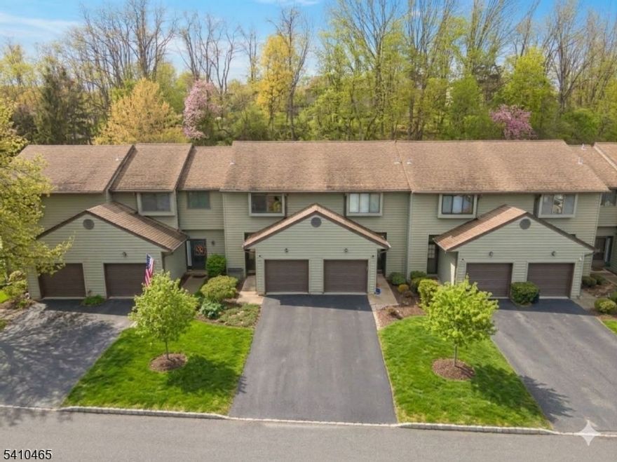 Welcome to desirable Hampton Commons in sought-after Hampton Township. This multi-level townhome offers a spacious layout with great bones and the opportunity to make it your own.A marble foyer leads to the open floor plan with Pergo flooring. The living room features a marble-framed corner wood-burning fireplace with oak mantle, vaulted ceilings, and sliding glass doors to the expanded deck. The deck is ideal for relaxing or entertaining and includes a direct gas line hookup with the grill included.The eat-in kitchen offers a pass-thru to the dining area. A brand new stove and over-the-range hood are scheduled for installation on 2/18/2026.Upstairs, the generously sized primary bedroom provides ample closet space and access to the full bath. A loft overlooking the living room offers flexible space for a home office, reading area, or guest overflow.The finished basement adds valuable living space for a recreation room, gym, media room, or additional living area. The lower level also includes the laundry area, utilities, new water heater (2025), new dryer (2025), and an owned water softener. A one-car attached garage and driveway parking add convenience.Residents enjoy community amenities including an in-ground pool, clubhouse with fitness area, playground, basketball, tennis, and pickleball courts. Minutes to shopping, dining, commuter routes, and all Sussex County has to offer.
