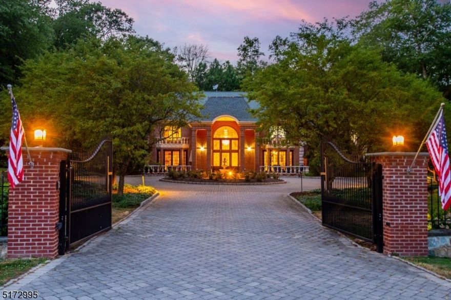 This fine luxury estate truly has it all with over 7,000 sq ft on over 2 acres of lush tranquil grounds. This is the one, from the state of the art movie theatre, to fully equipped pool house that can be used as a guest house. Enter through the gated entrance and into the grand 2 story front porch that leads to a dramatic butterfly staircase. First floor offers one level living floor plan, gourmet chefs kitchen with a double island, high end appliances, and a breakfast nook overlooking the massive pool. A great room with floor to ceiling windows that lead to the private backyard, sitting room that has been converted into an enclosed wine room with exit into the front porch, billiards room, a guest suit and laundry room. First floor primary suite includes 2 WIC, fireplace, a luxurious primary bath with a steam shower and a jetted tub. Second level has a large open space living area, 4 additional bedrooms that all have WIC and their own private bathrooms. Third level has been converted into a movie theatre with surround sound, powder room and living room with a bar just outside the enclosed movie theatre. Enter into the peaceful, relaxing backyard that has a heated gunite swimming pool with spa, gazebo overlook freshwater pond and a fully equipped pool house. Pool house has a full kitchen, private bedroom, full bath & living area. Speakers throughout, generator & water softener. High rated schools. TAXES ARE NOW UNDER $24,000