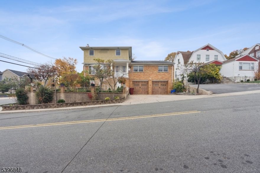 Bright and spacious 2-bedroom apartment on second floor of two-family home. Freshly re-finished hardwood floors, updated kitchen with granite counters and SS appliances, updated bathroom, central air and baseboard heat. Located within minutes of NYC transportation. Quiet neighborhood with convenient access to highways and shopping.