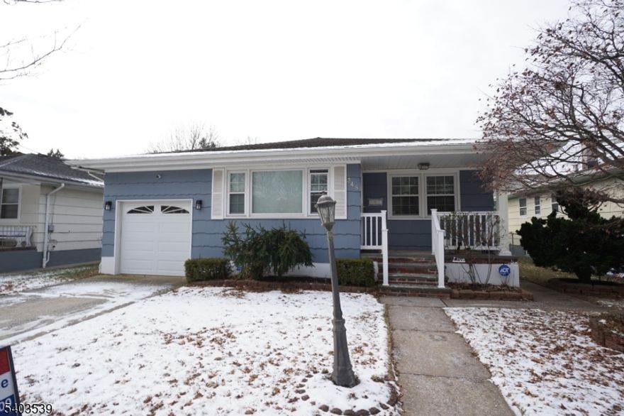 Prided Of Ownership Really Shows  On This beautiful Move In Ready 3 bedroom 1  & 1/2 Bath Ranch With Outstanding Features That Include Modern State Of The Art Kitchen And Baths.. Upgraded Windows.. Gas Heat, And Central Air.. 1 Car Garage .. Full High Basement  That Is Already Studded Out  With Rough Pluming For A New Bathroom.. Located In One Of rahways Finest Locations.. Just Minutes to 3 Train Stations And All Major Highways.. A Must See Home..