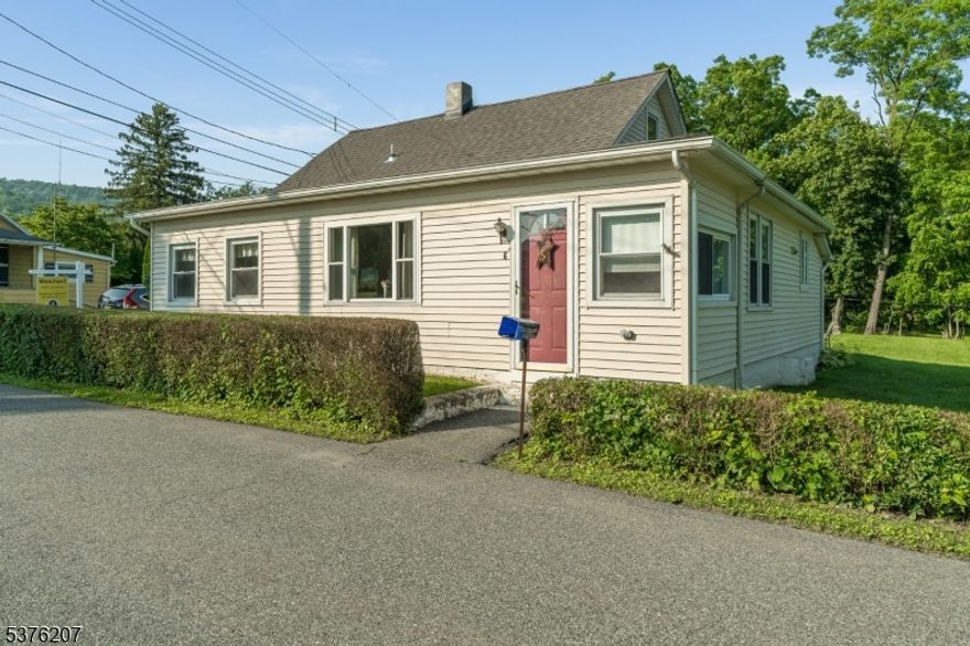 Fantastic opportunity to own a single family home with level, open yard.  Whether down sizing, first time buyer, snow bird, etc. this home is perfect! Newer septic has been tested and has passed with flying colors. Recently painted interior & newer gas furnace. New roof April 2025, Updated front window, vinyl siding, city water and Natural gas are excellent features. There appears to have been a stairway leading to the attic which possibly served as a bedroom.  Very convenient to main routes, local farm stands, stores & hospital. Shed as is.  Enjoy the country surroundings of a small village and yet minutes to major routes such as Rt 57,31, 22 & 78. Just up the road is beautiful Merrill Creek Reservoir for boating, dog walking and hiking.