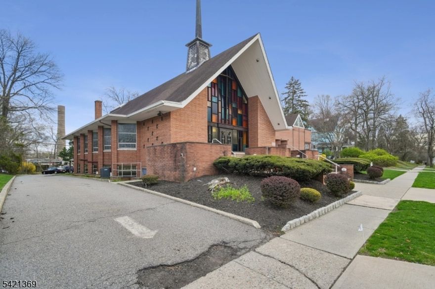 Beautiful welcoming large sanctuary filled with sunlight and stunning details throughout.  This perfect Montclair location and parking create an easy transition. Large offices, several meeting rooms, and a lower level with a full kitchen, and beautiful large stage for many uses. There is an elevator to make sure all can attend. A must see to admire this beautiful structure with so many great features in the ultimate Montclair Location.