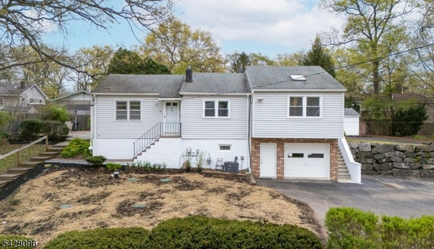 Move-in ready, raised ranch, with an easily accessible, flat backyard, and entryway through the sunroom, patio, or deck. This meticulously maintained ranch has a brand new septic system,  new radon system, new windows, and. high-tech water filtration system. Hardwood floors throughout carpeting in the living room, which features a vaulted ceiling and skylights. Central air and forced hot air, efficient home. Located just blocks from Greenwood Lake, and just across the street from hiking trails. There are several flex spaces throughout the home as well as a storage shed with a workshop. Centrally located to New Jersey transit only an hour from New York City, several highways easily accessible for commuters. All the boxes have been checked. All there is to do is move in and make it your own.