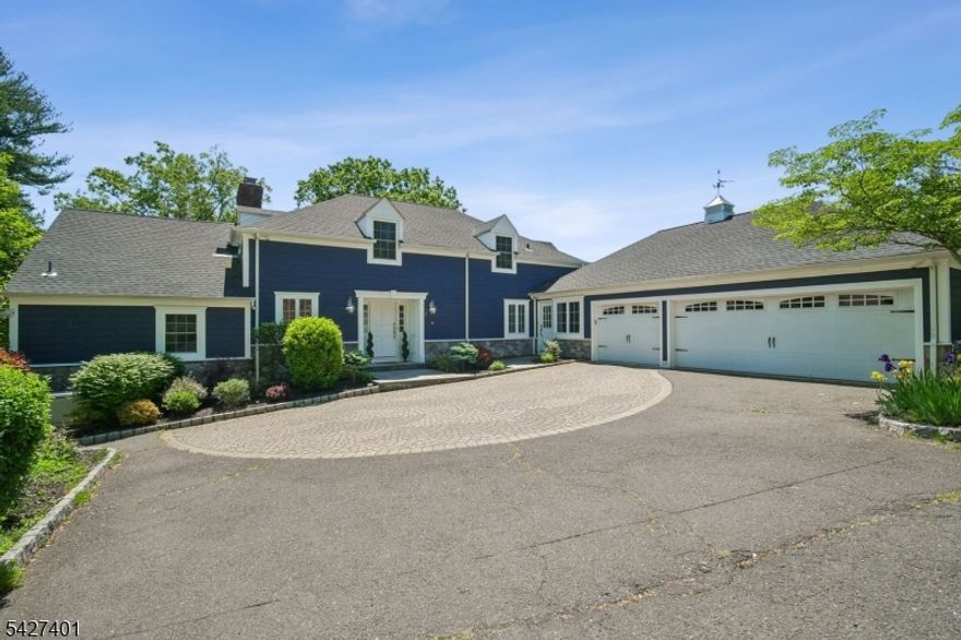 A premier  location with breathtaking skyline views! This 4 BR, 3.5 BA custom home blends luxury, space, and modern upgrades on a professionally landscaped, fully fenced property with an in ground sprinkler system. Open-concept living and dining room area flows into a gourmet kitchen featuring a large center island, granite countertops, and SS appliances. Enjoy seamless indoor-outdoor living with a maintenance-free Trex deck with professional lighting and a spacious lower level paver patio. The first-floor primary suite offers a spa-like bath and custom walk-in closet. While upstairs offers three spacious bedrooms with generous closets,  a shared bath and a finished bonus room. The walk out lower level includes a fireside family room, wet bar, full bath and private guest suite.  A rare offering in highly sought-after location.