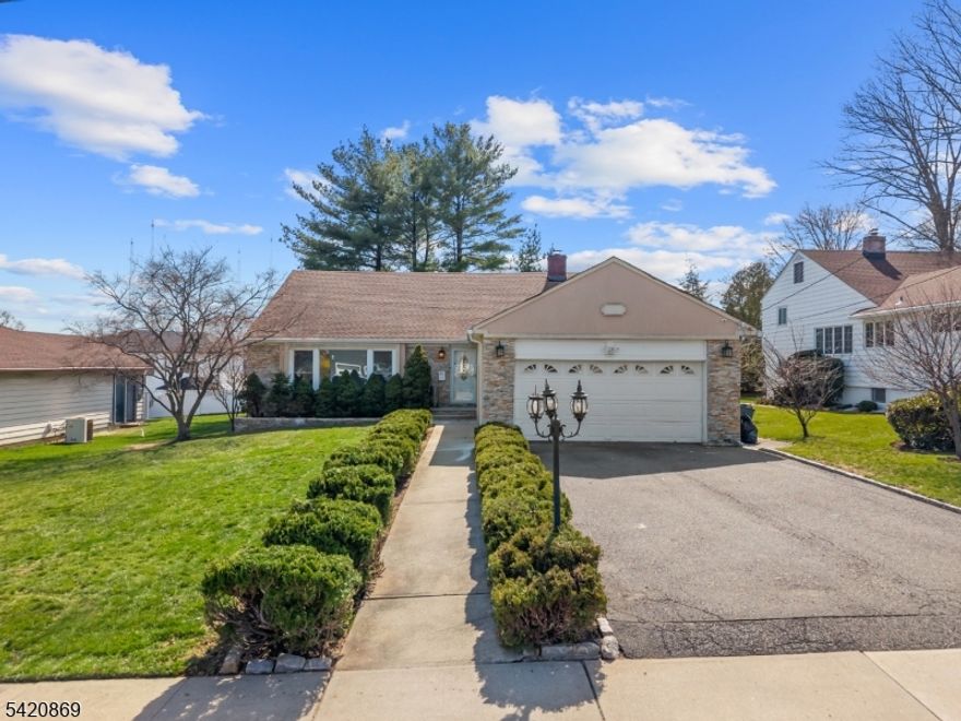 Welcome to this beautifully expanded split-level home nestled in the highly sought-after Montclair Heights section of Clifton! Offering the perfect blend of space, style, and functionality, this home features 4 spacious bedrooms and 3 full bathrooms perfect for comfortable and flexible living.Step inside to a bright and inviting living room that flows seamlessly into the formal dining room, ideal for entertaining or everyday enjoyment. The modern kitchen is thoughtfully updated with sleek finishes and contemporary appliances, making it the true heart of the home.The lower level offers a versatile family room, perfect for relaxing or hosting gatherings, along with a full bathroom for added convenience. Upstairs, you'll find a generously sized primary bedroom, two additional bedrooms. Ideal for a home office, playroom, or guest space.Step outside into your private outdoor oasis featuring a beautiful backyard complete with a deck perfect for entertaining, summer gatherings, or simply unwinding.Conveniently located near schools, transportation, parks, and shopping, this home truly checks every box. Don't miss the opportunity to own a standout property in one of Clifton's most desirable neighborhoods!