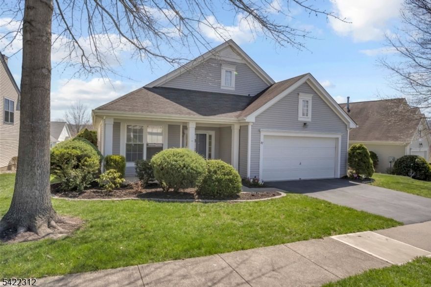 Welcome to 87 Kensington Circle, a well-maintained, single-level home located in the desirable Brookfield Estates 55+ community. This inviting residence features two bedrooms and two full bathrooms. As you enter, you're greeted by a bright, open layout with fresh paint and brand-new carpet throughout.  The home offers a spacious kitchen with an eat-in dining area, along with two generously sized bedrooms, including a primary suite with a walk-in closet and ensuite bath. A two-car attached garage, and central vacuum system provides added convenience.  Enjoy an amenity-filled lifestyle with access to a fitness center, pool, tennis and pickleball courts, bocce ball, and a clubhouse. Low HOA dues also include exterior maintenance and snow removal. Ideally situated near shopping, dining, and major roadways, this home is perfectly located for active adult living.