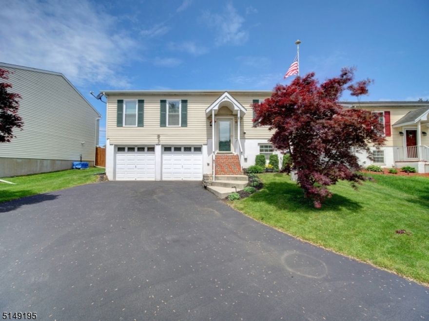 This 3-bedroom, 2 bathroom Bi-Level home offers a New Roof and Gutters (2021, transferable warranty), updated AC, Furnace and Water Heater (all within the last 6 years, AC/Furnace has transferable warranty), Radon System (2015) and is located on a cul-de-sac.   This home offers two levels of living providing an open floor plan.  An inviting entry leading upstairs to the living room.  The spacious eat-in kitchen features separate dining area, plenty of counter space, pantry, SS appliances and a center island with sliders to the deck/yard.  There are 3 bedrooms and a full bath (with skylight) that complete the first level.  The lower level/ground floor has a family room/den area complete with a full bath containing a new tile floor (2021), new carpeting (2021) with the potential for a 4th bedroom.  Plenty of closet space throughout including storage under the stairs.  The utility/laundry room and access to the 2-car extended/oversize garage complete with a work area is located on the lower level/ground floor.  Enjoy the comfort of your backyard with your retractable awning over the recently redone deck complete with a fenced in yard, shed and firepit.  Conveniently located close to all major highways 22/33/78, schools, dining and shops.