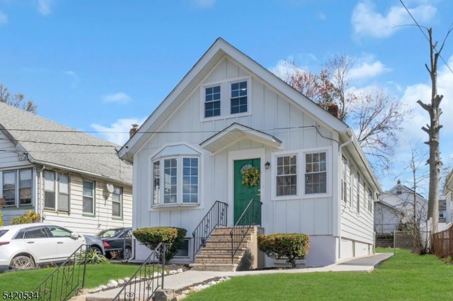 Fully renovated and full of charm, 1573 Wyndmoor Avenue in Hillside is the one you've been waiting for. This stylish 3-bedroom, 1-bath home features a converted attic loft primary bedroom, original hardwood floors, recessed lighting throughout, elegant bay windows, and a beautifully updated kitchen with quartz countertops, new soft-close cabinets, and new appliances. The clean, open basement offers excellent bonus space with potential for future finishing, while the eye-catching board and batten exterior adds fresh modern curb appeal. Step outside to enjoy a spacious backyard perfect for entertaining, play, or quiet evenings at home. Conveniently located near Route 22, I-78, the Garden State Parkway, and regional NJ TRANSIT connections, Hillside is ideal for commuters seeking access to Newark, New York City, and Newark Liberty International Airport, while still enjoying the benefits of a residential neighborhood close to everyday conveniences.