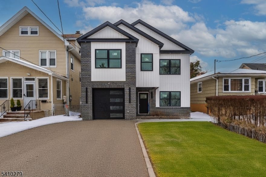 Brand new 2,950 sq. ft. of living space.4/5 bedroom 3 1/2 baths Colonial in the Elmora Section of Elizabeth. 5 year tax abatement. 10 Year Home Warranty.Open Floor Concept. 5th Bedroom on ground level could be used as an office or in-law suite with full bath. All bedrooms have their own walk-in closet. 2 HVAC Units. Electric cars charger in garage. Perfect location for shopping, schools, houses of worship, airport and highways. New York bus at corner.